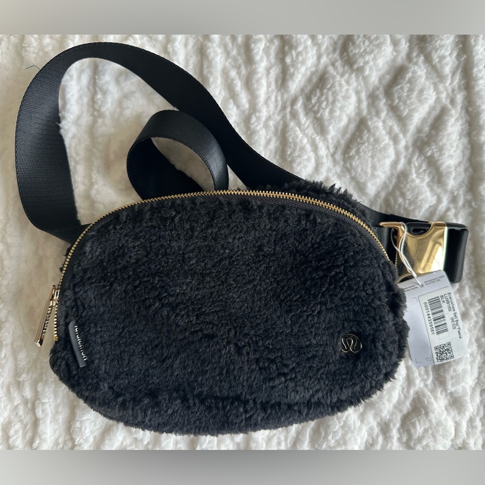 lululemon athletica Black Fleece Crossbody Black Bag with Gold Accents 1L